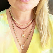 lady wearing Crystal and Rainbow Tourmaline Necklace