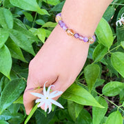 amethyst citrine bracelet in hand with flower