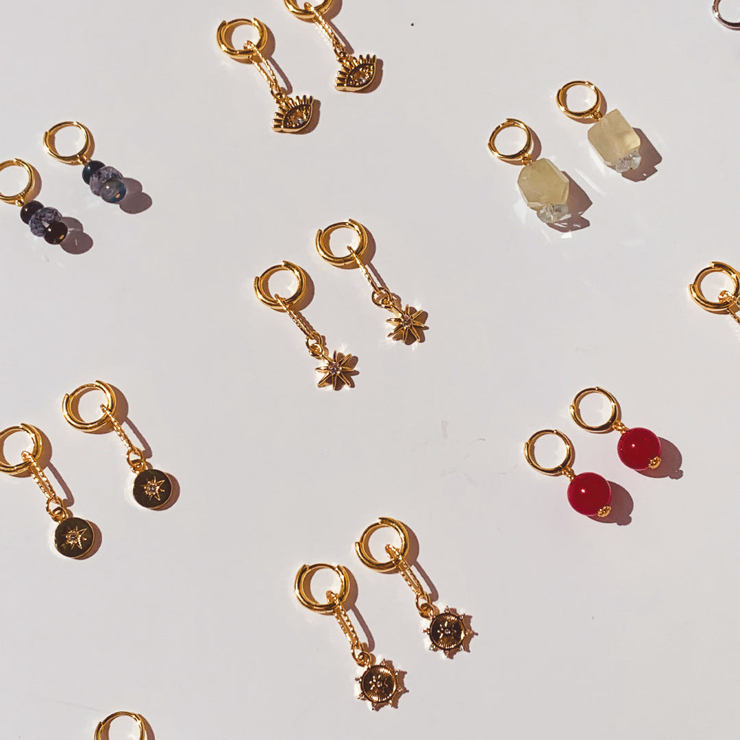 variety of evil eye hoops